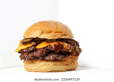 Classic Double beef smash burger with jalapeno on white background 