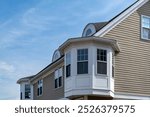 Classic family home with bay window and circular dormer windows in Boston, Massachusetts, USA