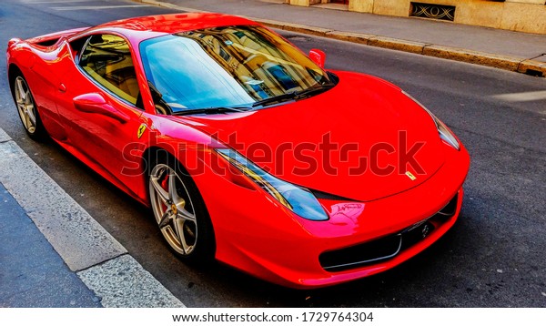 Classic Ferrari auto in the Via Montenapoleone -\
Milan. Mars, 2015.