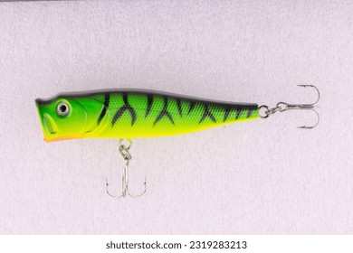 Classic Fishing Lure Wobbler with hooks isolated on white - Shutterstock ID 2319283213