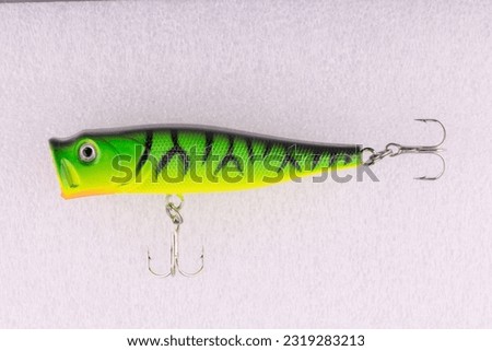 Classic Fishing Lure Wobbler with hooks isolated on white