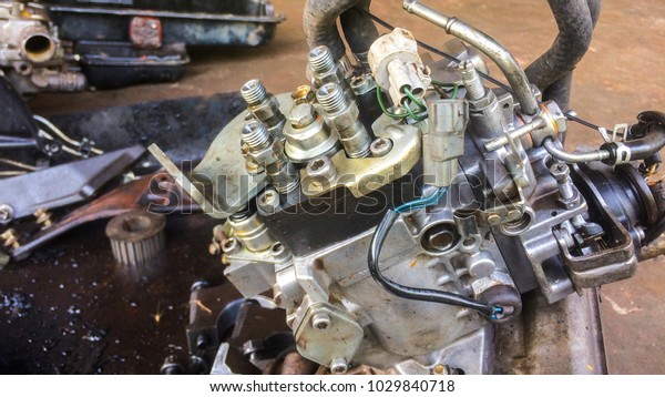 A classic fragment of diesel car\
engine or truck engine with copy space for text. Metallic\
background of the internal diesel truck engine or car\
engine.