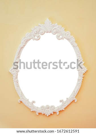 Classic frame template oval shape white color on yellow background and blank inside for text or copy space.