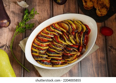 Classic French Ratatouille Vegetables And Bread On The Wiidwn Table