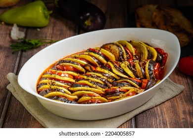 Classic French Ratatouille Vegetables And Bread On The Wiidwn Table