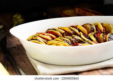 Classic French Ratatouille Vegetables And Bread On The Wiidwn Table