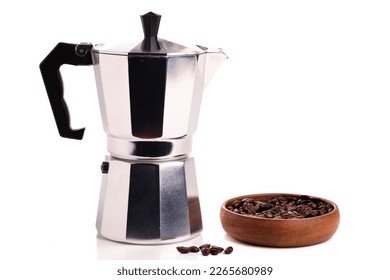 classic geyser coffeemaker and coffee beans closeup isolated on white background.