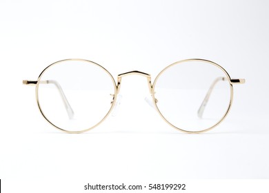 Classic gold round glasses isolated
