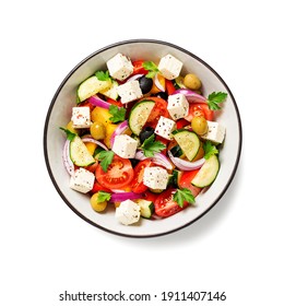 Classic Greek Salad With Fresh Vegetables, Feta Cheese And  Olives. Healthy Food. Isolated On White Background. Top View