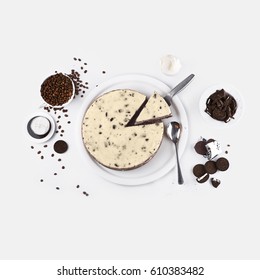 Classic Homemade Oreo Cheesecake With Chocolate, Coffee And Cookies Top View Isolated