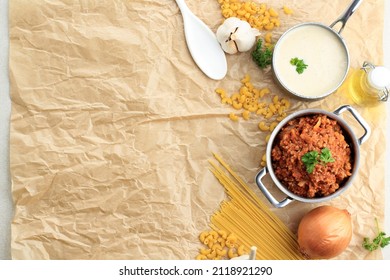 Classic Homemade Tomato Sauce And White Creamy Sauce For Pasta And Lasagna In The Pan. Preparation Making Pasta. Top View, Copy Space