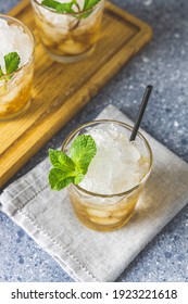 Classic Kentucky Derby Cocktail The Mint Julep Isolated On Light Gray Table Surface. Close Up, Shallow Depth Of The Field.