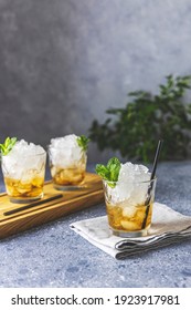 Classic Kentucky Derby Cocktail The Mint Julep Isolated On Light Gray Table Surface. Close Up, Shallow Depth Of The Field.