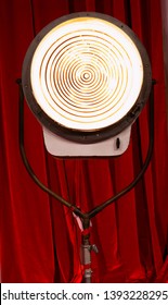 Classic Large Film Studio Light On A Stand.  Repurposed Vintage Movie Or Television Lighting Fixture With Lens On Stand  Reminiscent Of 1940's Keg Light. Also Has Theatrical Look.  