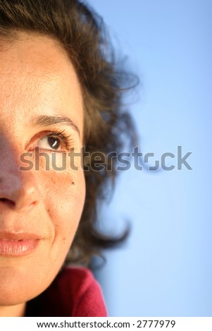 Similar – a woman lies on a green sofa. resting.