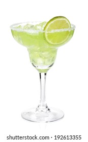 Classic margarita cocktail with lime slice and salty rim. Isolated on white background