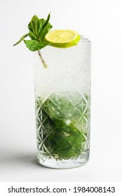 Classic mojito isolated on white background. Summer menu, cold refreshing beverage for hot weather. Close up.
