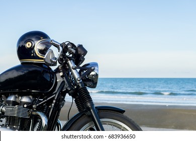 classic motorcycle on the beach - Powered by Shutterstock