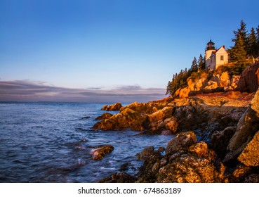 A Classic New England Lighthouse, The Bass Harbor Head Light In The First Light Of Dawn, Acadia National Park, Maine, USA