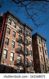 Classic Old Apartment Building With Fire Escape, New York City