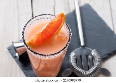 Classic Paloma Cocktail On White Wooden Table