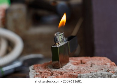 Classic petrol lighter. Burning petrol lighter