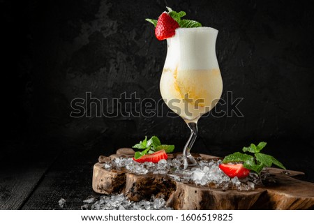 Classic pinacolada cocktail. Cocktail card.  Background black boards.