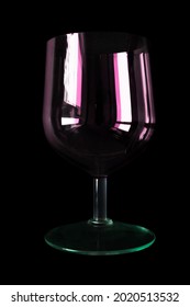 Classic Pink Empty Wineglass Isolated On Black Background