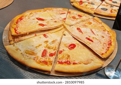 Classic ‘Margherita’ pizza, made with a thin base, tomato sauce and mozzarella.