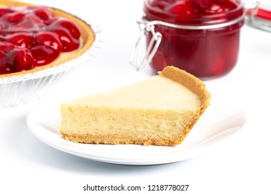 A Classic Plain No Bake Cheesecake In A Graham Cracker Crust And Cherries