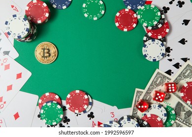 Classic Playing Cards, Chips, Red Dice, Bitcoin And Dollars On Green Background. Gambling And Casino Concept. Flat Lay Design.