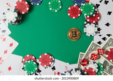 Classic Playing Cards, Chips, Red Dice, Bitcoin And Dollars On Green Background. Gambling And Casino Concept. Flat Lay Design.