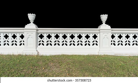 Classic railing with grass isolated on black background