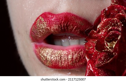 Classic Red Lips With Sexy Smirk. Textured Lips With Gloss Red Lipstick. Passionate Red Lips. Gold Paint From The Lips With Gold Rose