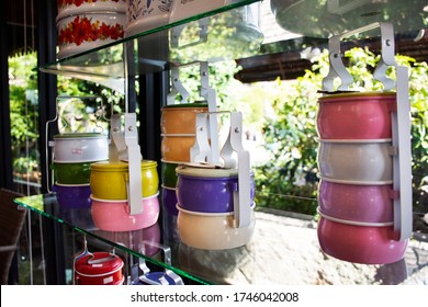 Classic Retro Vintage Colorful Pastel Tiffin Food Carriers Or Dabbas Or Lunch Box On Shelf For Show And Sale At Modern Shop In Bangkok, Thailand