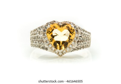 Classic Ring With A Yellow Topaz Stone On White Background