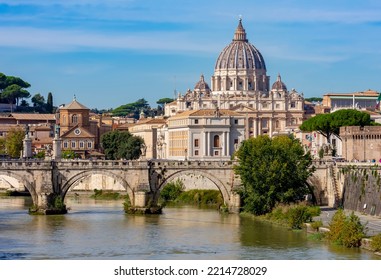 Classic Rome cityscape with St Peter's basilica in Vatican and St. Angel bridge over Tiber, Italy
