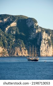 Classic Sailboat Anchored In The Bay At Sunrise