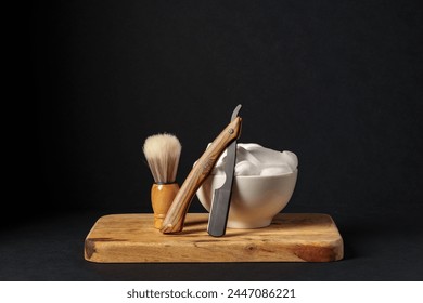 Classic Shaving Equipment With Razor, Brush, and Soap on Wooden Stand Against Dark Background - Powered by Shutterstock