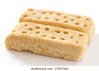 Classic Shortbread Finger Biscuits On White Surface