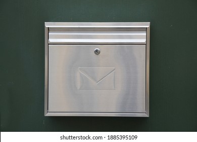 Classic Silver Metal Mailbox Post With An Envelope Icon