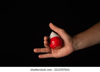 Classic Spinner Top Toy Close Up, Black Background