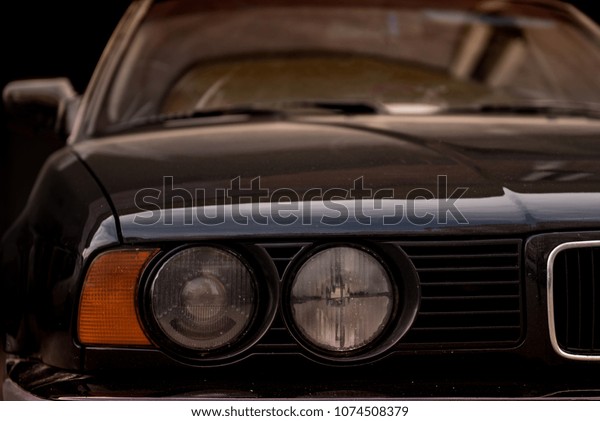 classic sport car head\
lamp. sunlight