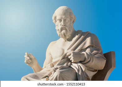 classic statue of Greek philosopher Plato while sitting