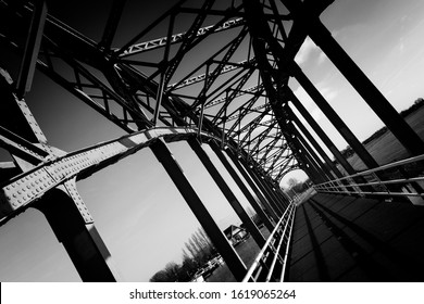 Classic Steel Truss Bridge In Black And White