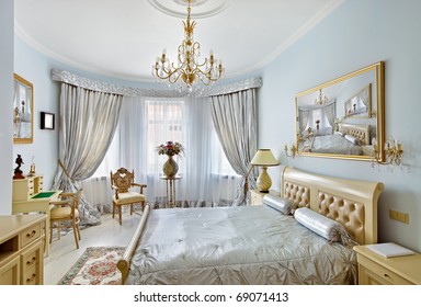 Classic Style Luxury Bedroom Interior In Blue Colors With Boudoir And Window