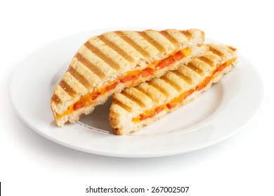 Classic Tomato And Cheese Toasted Sandwich On White Plate.