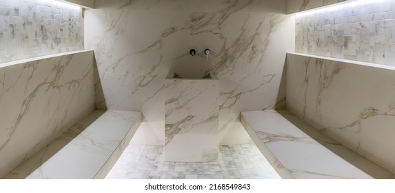 Classic Turkish Hammam. White Turkish Bath With Marble Surfaces. Marble Oriental Bathroom. Steam Bath Interior. Traditional Turkish Bathroom Interior.