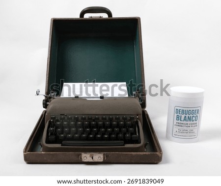 Classic typewriter with printed code and Debugger Blanco. Creative image illustrating coding humor and technology nostalgia.