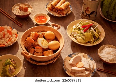 A classic Vietnamese dish with caramelized pork and eggs as the main dish and other foods. Tet holiday concept. Vietnamese Tet traditional food - Powered by Shutterstock